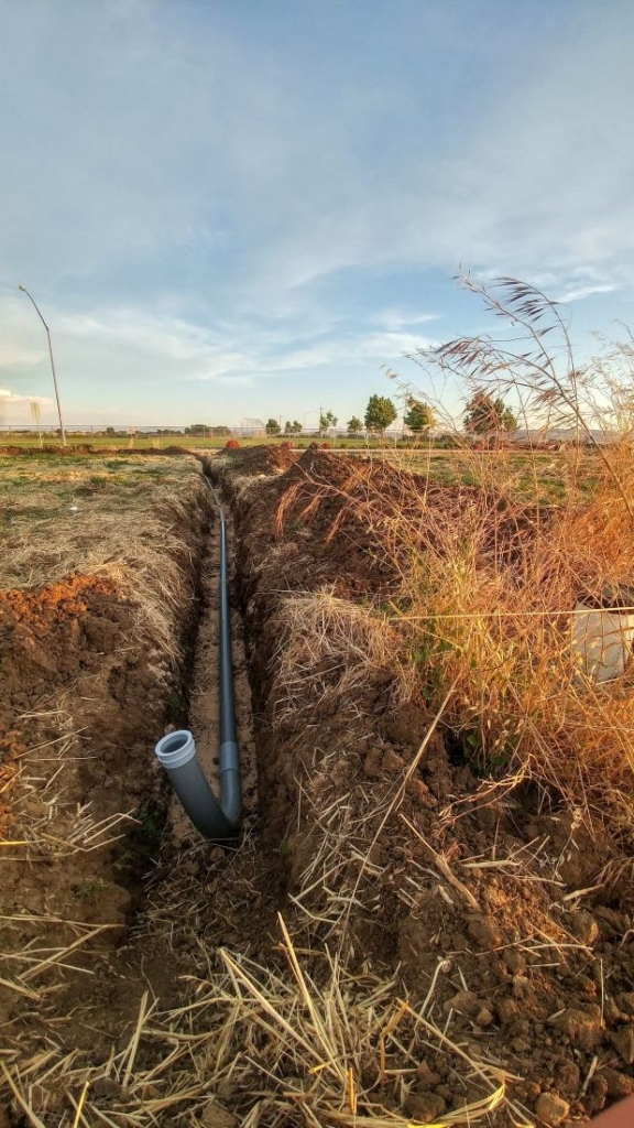 conduit next to a well hole