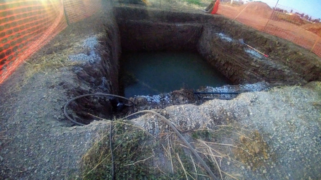 Deep hole filled with water