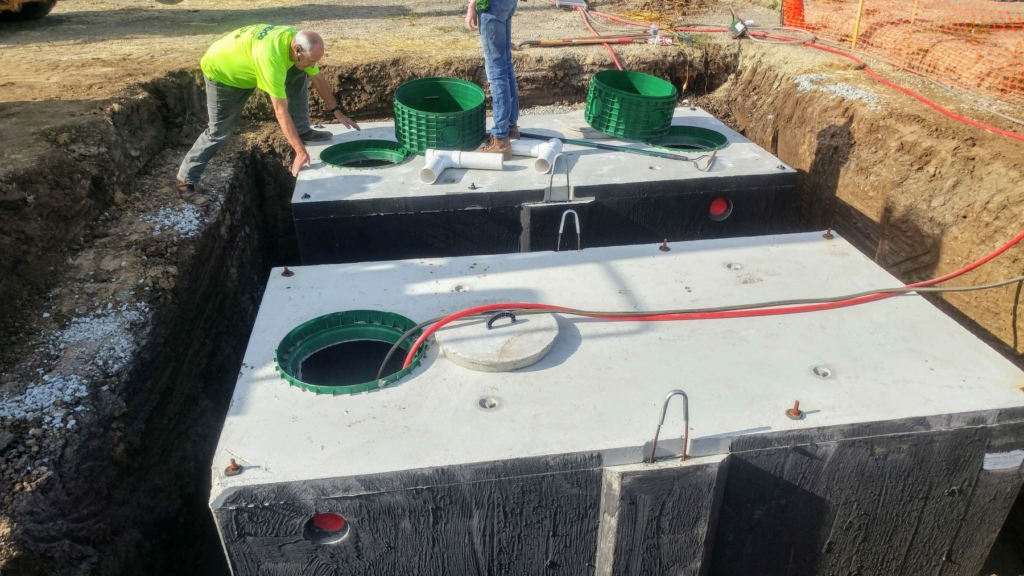 Pumping water into septic tanks from ground water