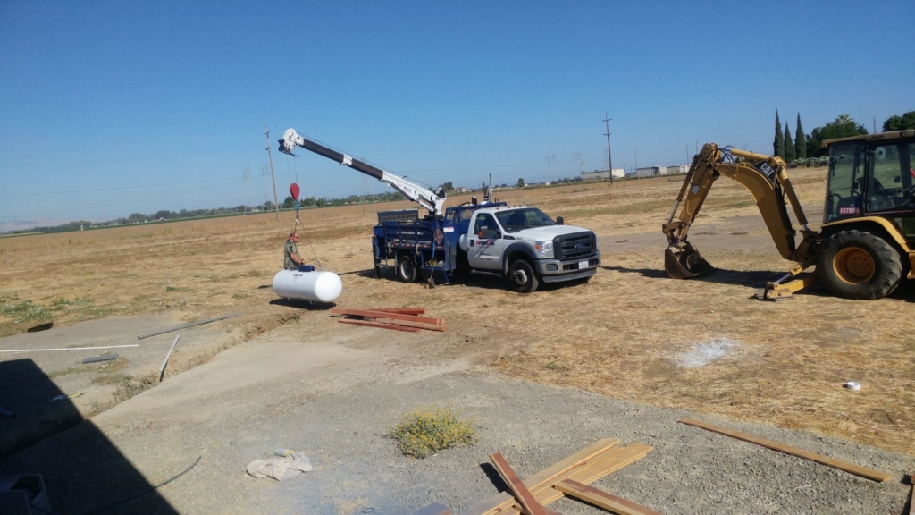 Amerigas truck delivering a 250gal tank