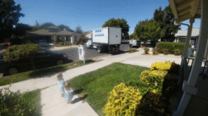 moving storage being unloaded in a driveway